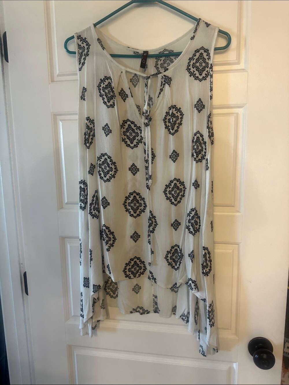 Sleeveless White Tunic Top with Black Medallion Print